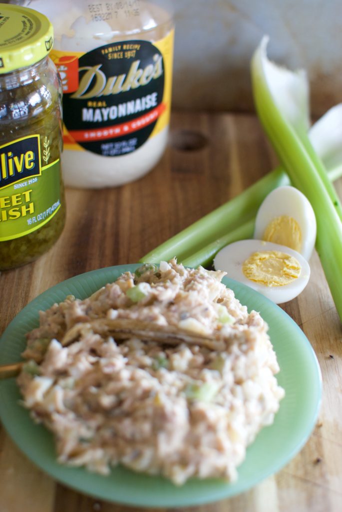 Crisp celery and sweet onions, creamy eggs, and sweet relish are stirred together with tuna to make a classic tuna salad recipe your great grandmother would be proud of.