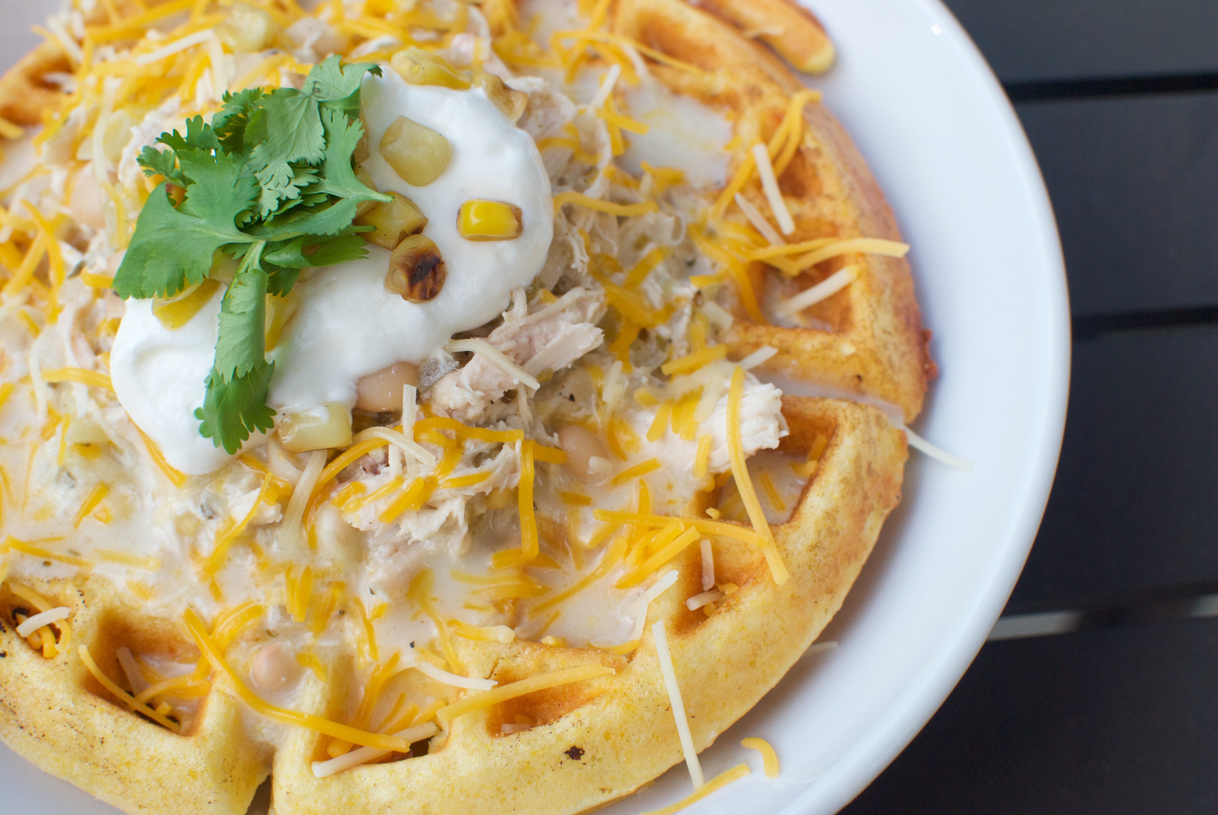 white bean chicken chili over cornbread waffles is a fun and festive soup any night of the week!