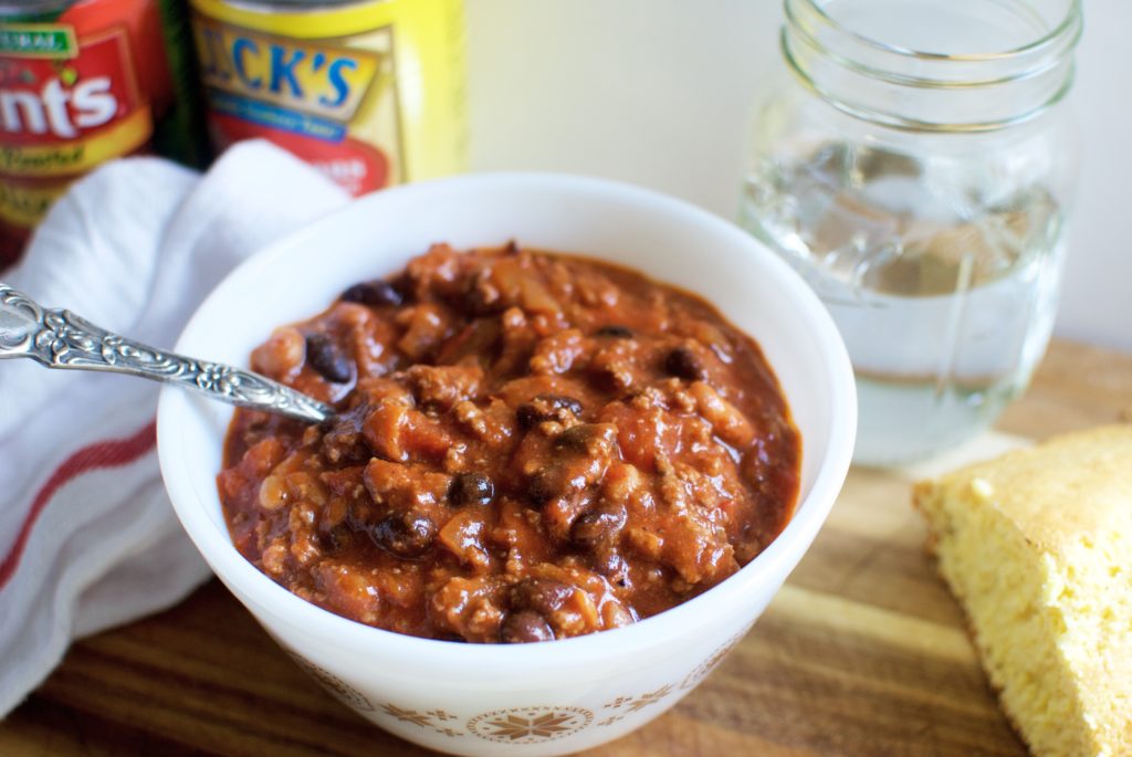 This chili recipe is great any night of the week, top with taco toppings and you have a complete meal in no time!