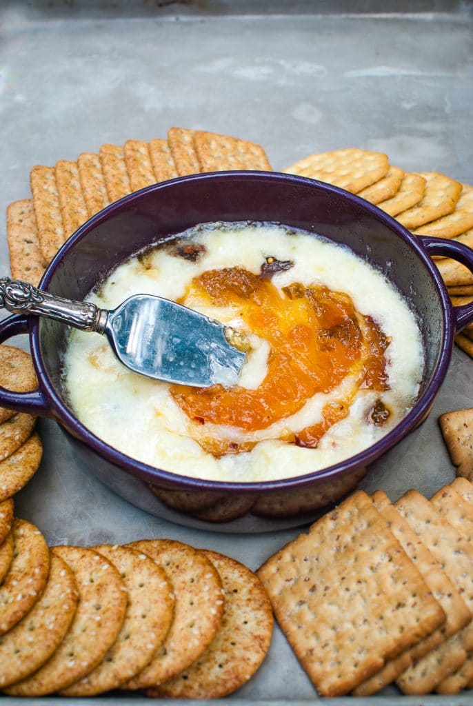 baked brie with apricot preserves on top 