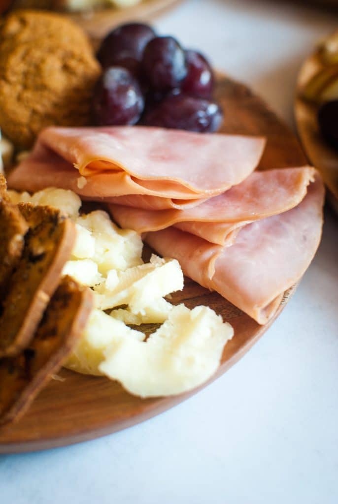 cheese on a small wooden plate