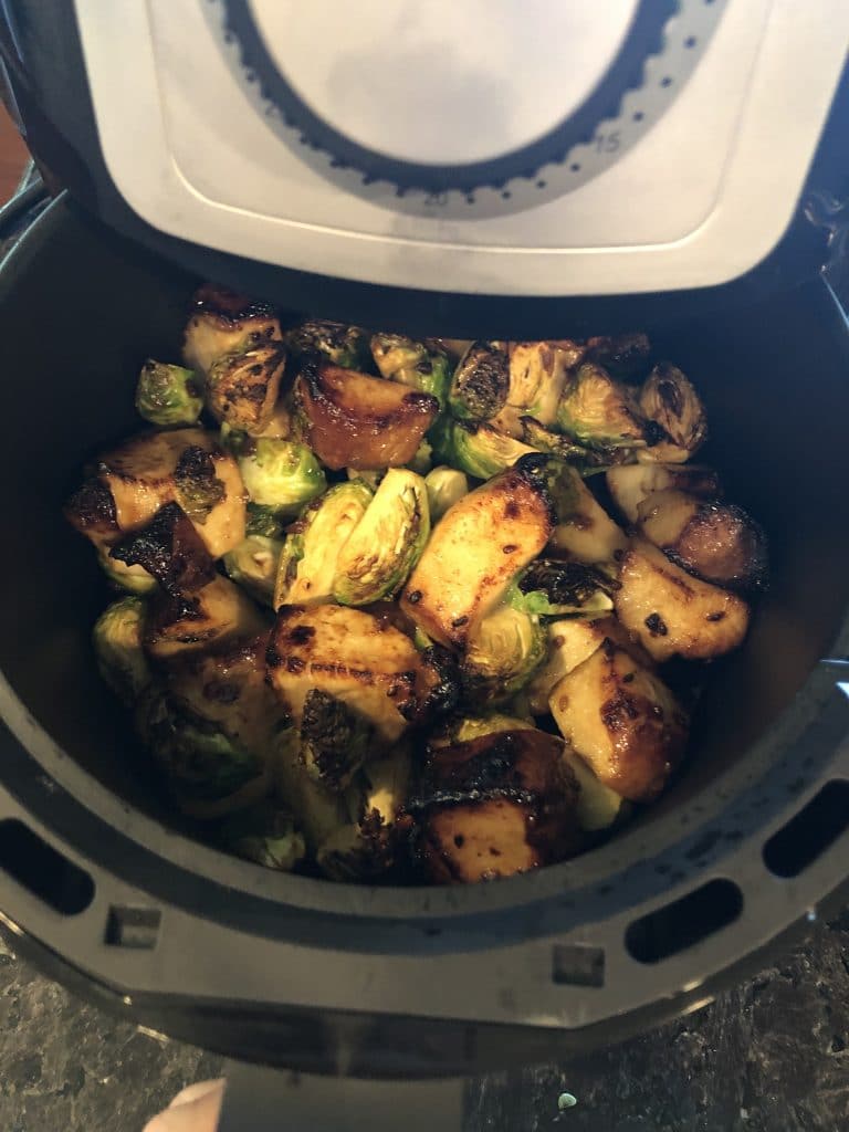 chicken and vegetables in an air fryer