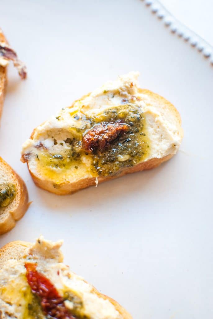 Goat Cheese with Pesto and Sun Dried Tomatoes
