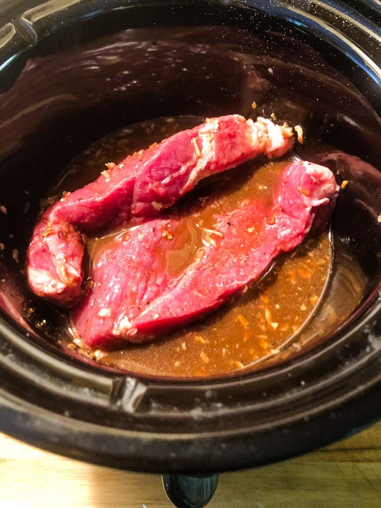 meat in a 2 quart slow cooker