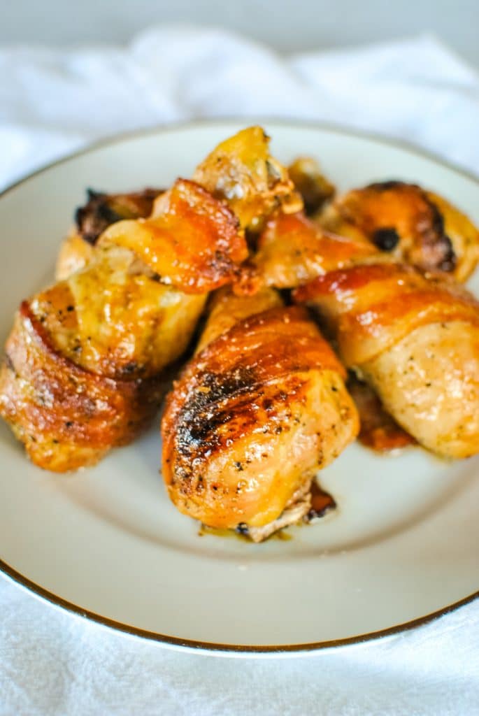 Sweey and Spicy Bacon-Wrapped Chicken Legs