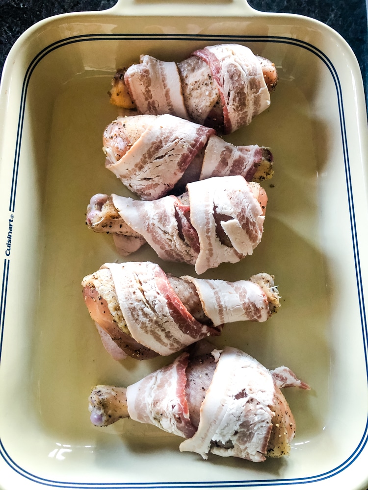 Wrapping bacon on drumsticks