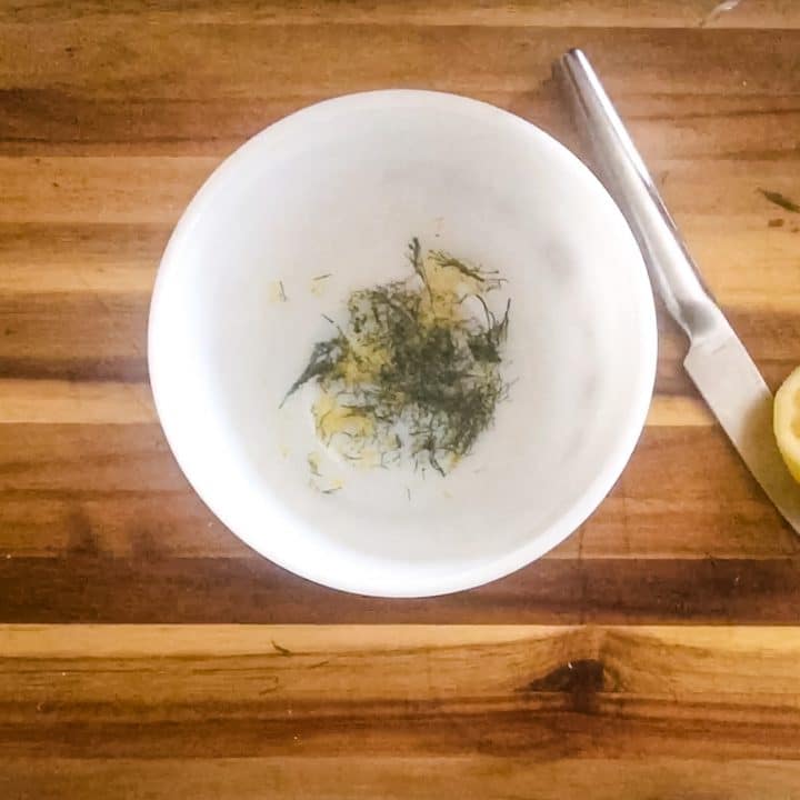 garlic lemon and dill in a bowl