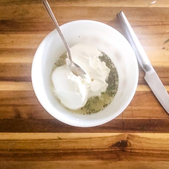 making garlic lemon sour cream dip