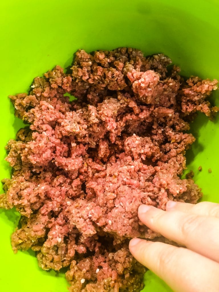 Mixing ground beef with your hands