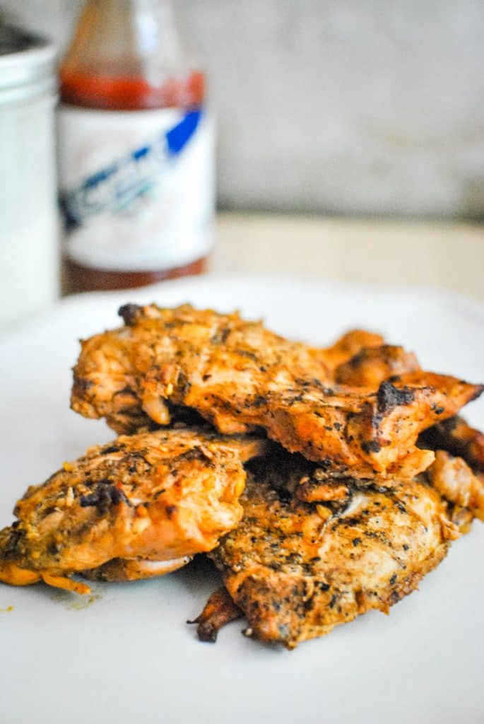 Buffalo Ranch Chicken Thighs with Cristal Hot Sauce