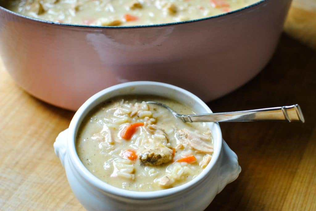 turkey soup with pink le creuset dutch oven