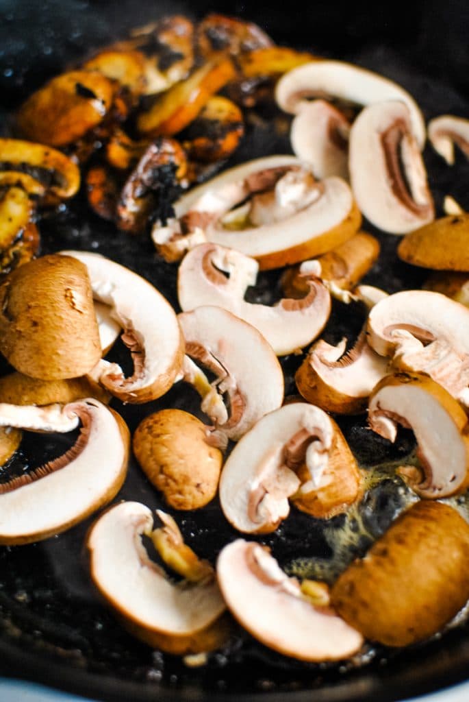 mushrooms in a cast iron skillet