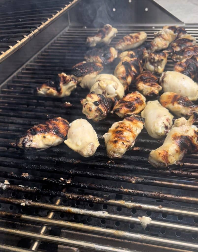 cooking wings on a grill