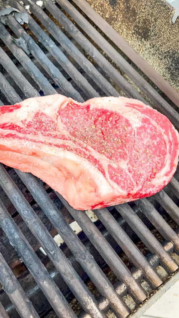 searing a steak on a hot grill 