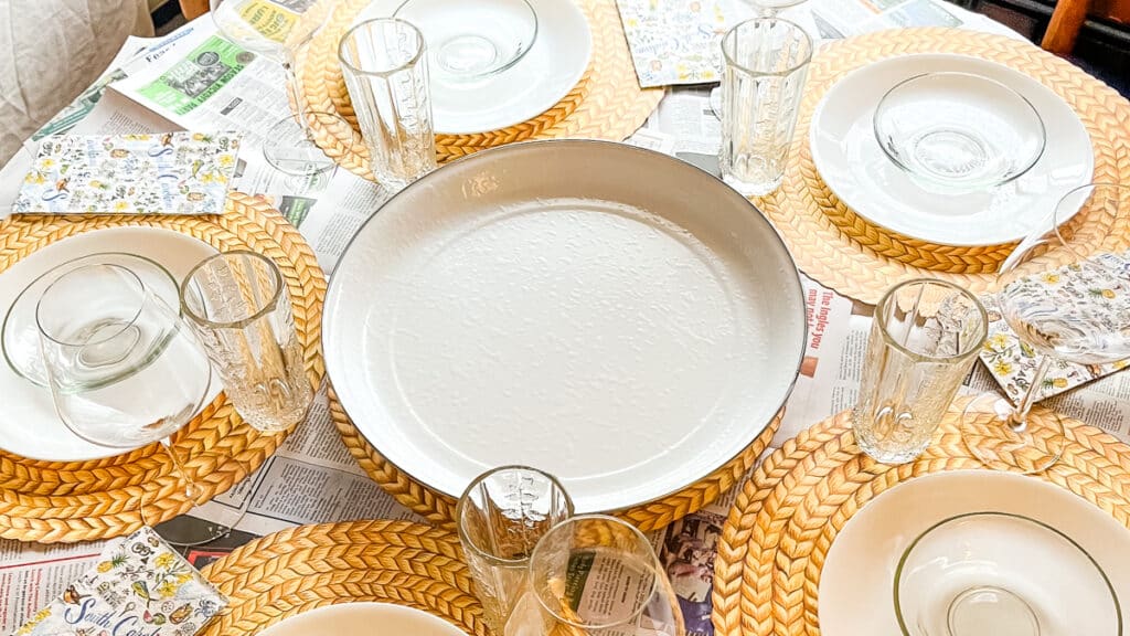 golden rabbit enamelware round platter on a table
