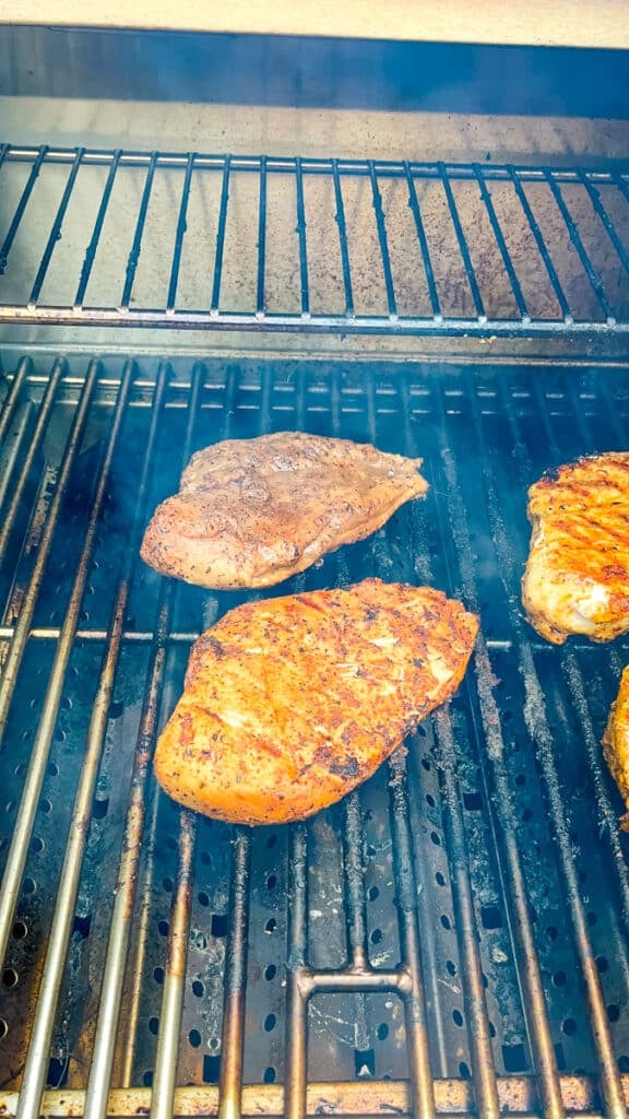 grilling seasoned chicken