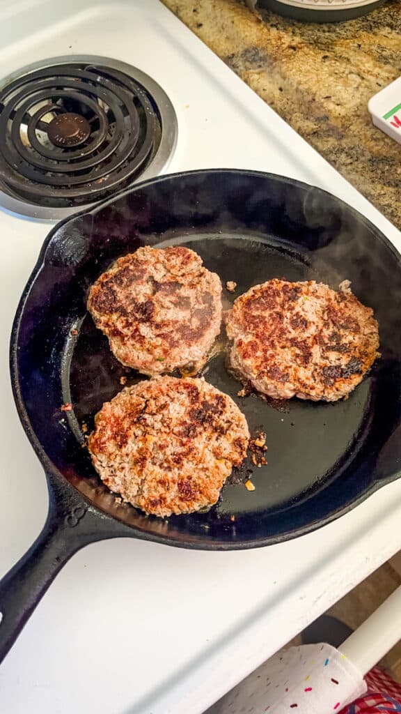 cooking burger patties on the stove top