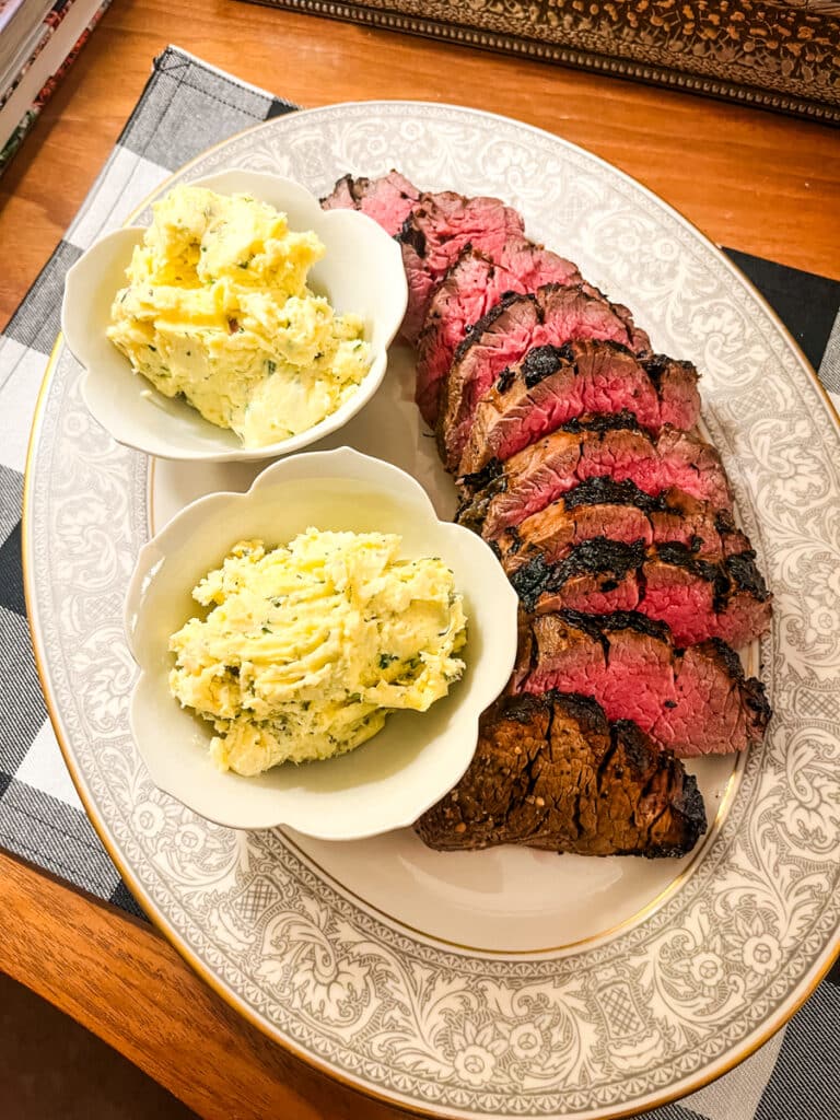 steak butter with filet on a big platter