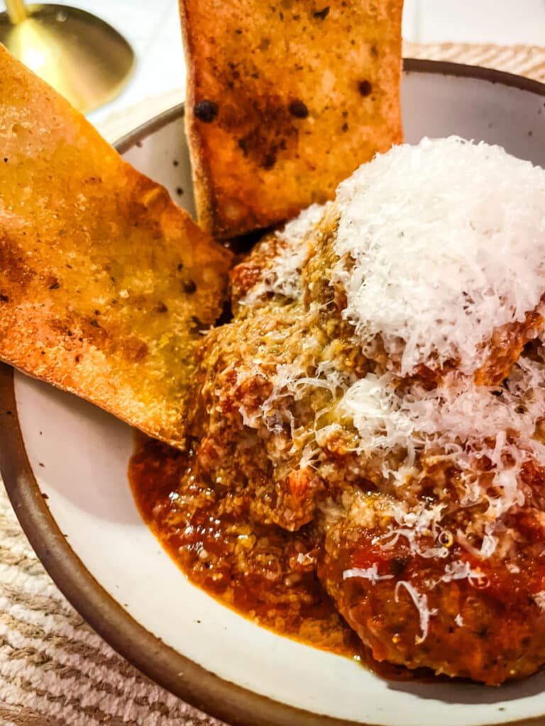 oven baked meatballs in red sauce