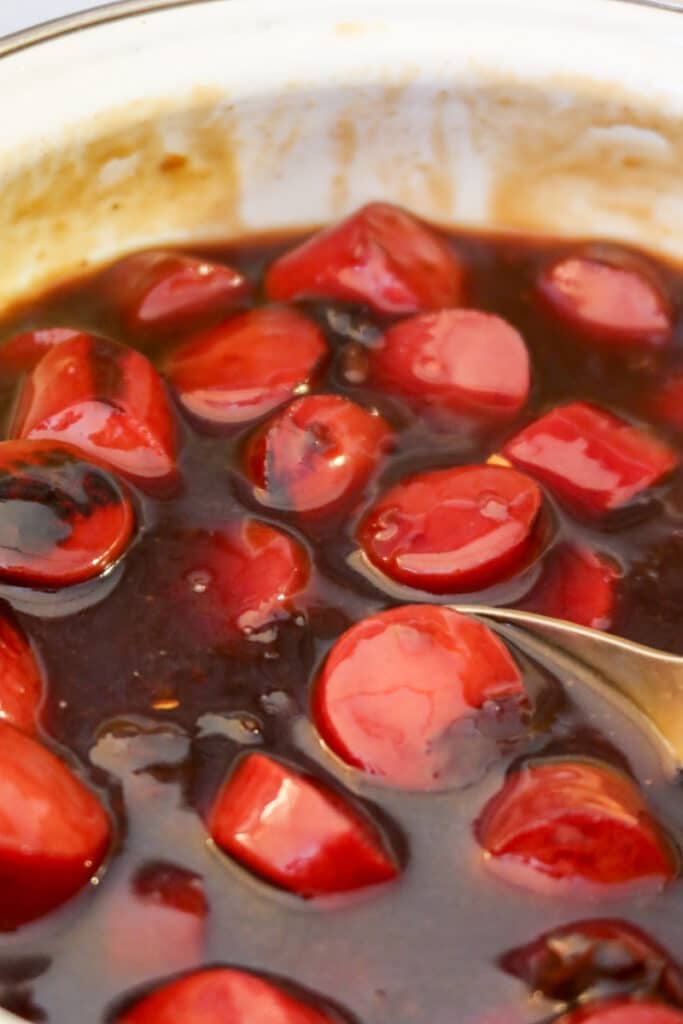 This easy 3-ingredient kielbasa appetizer combines teriyaki sauce, plum preserves, and smoked kielbasa for a sweet-and-savory bite straight out of a 90s party menu. Perfect for game day, potlucks, and holiday spreads — slow cooker or oven-friendly!