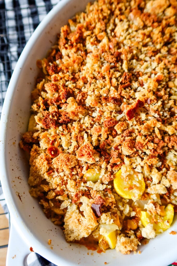 Sunshine Casserole hot out of the oven with melted cheese and golden stuffing topping.