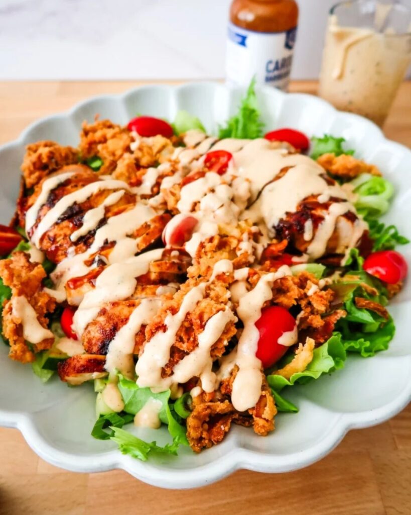 BBQ chicken salad topped with crispy onions, perfect for football game day grub