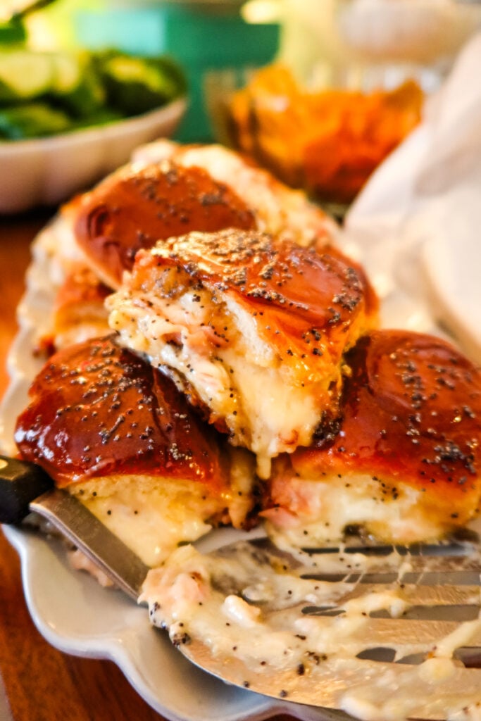Freshly baked ham and Swiss onion sliders