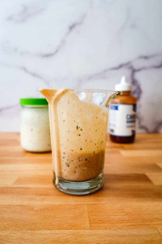 measuring cup salad dressing
