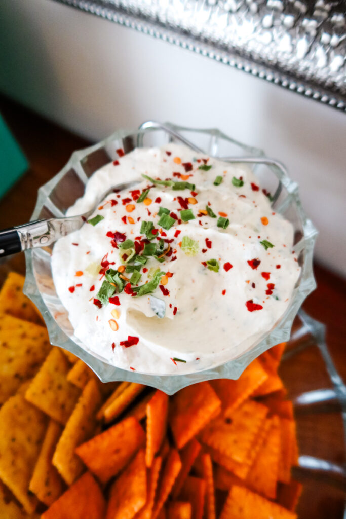 zesty firecracker dip in a vintage chip and dip server with crackers