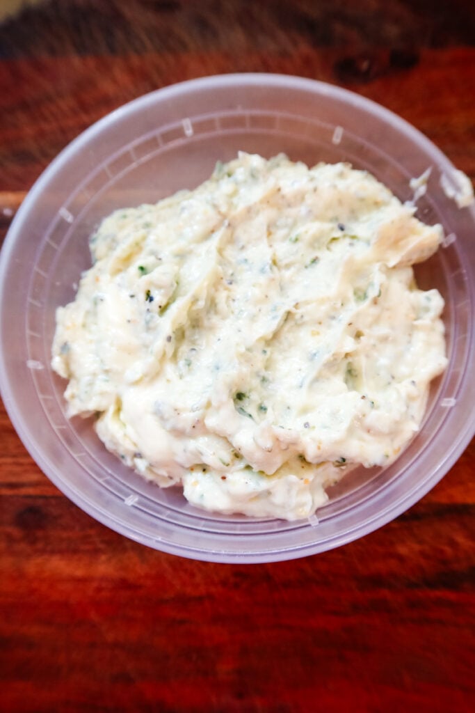Overhead view of Thanksgiving Butternaise with herbs and pepper swirled through creamy butter and mayonnaise.