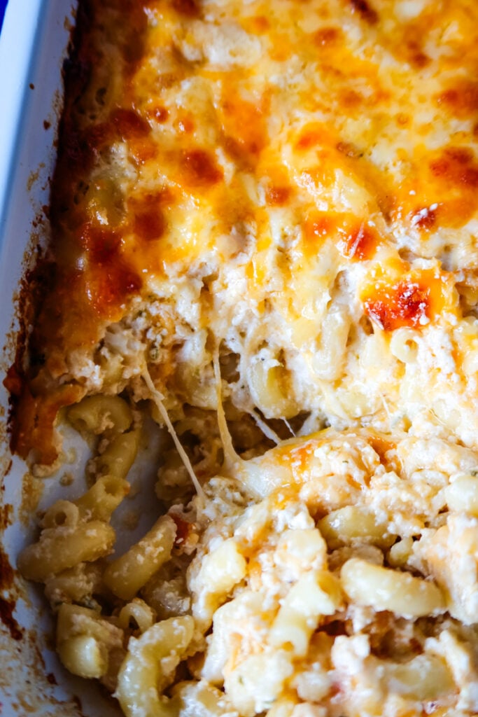 A hot baked macaroni and cheese casserole with a perfectly browned, bubbly cheese topping.