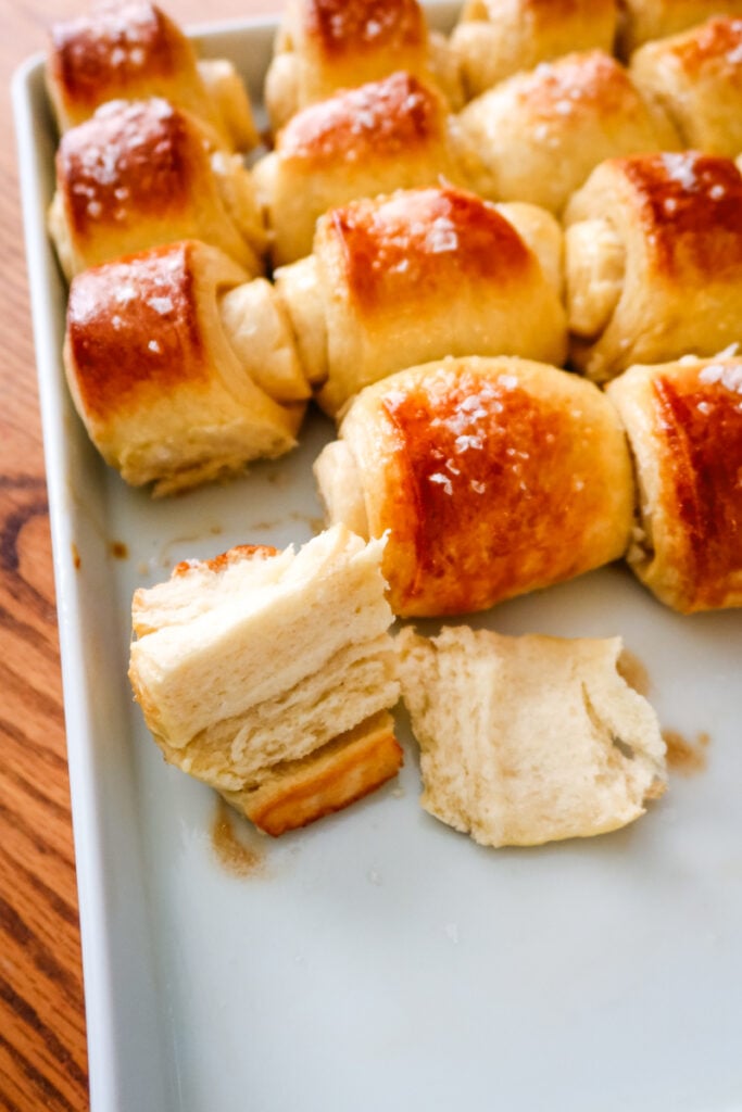 Look at those layers! These Parkerhouse Rolls bake into the softest, pull-apart texture thanks to honey, warm milk, and a slow rise. Perfect for holiday tables or cozy Sunday dinners. Learn how to get this tender, bakery-style interior at home with an easy, beginner-friendly recipe.