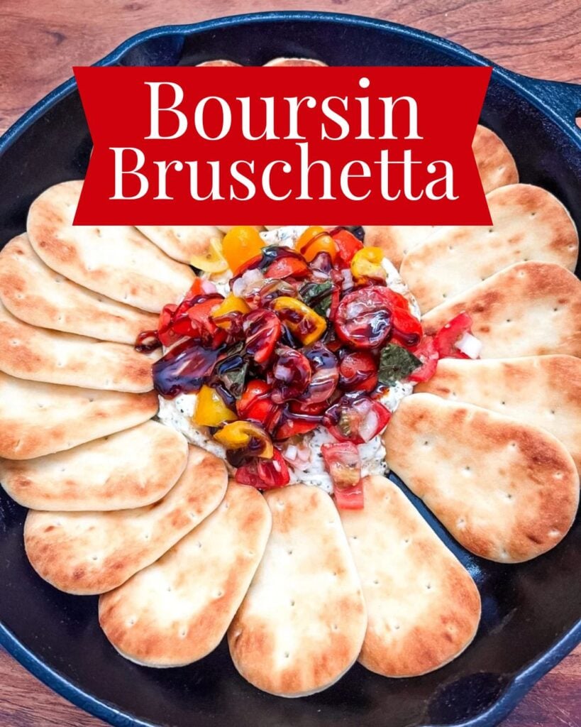 Boursin Bruschetta Appetizer in the center of a cast iron skillet
