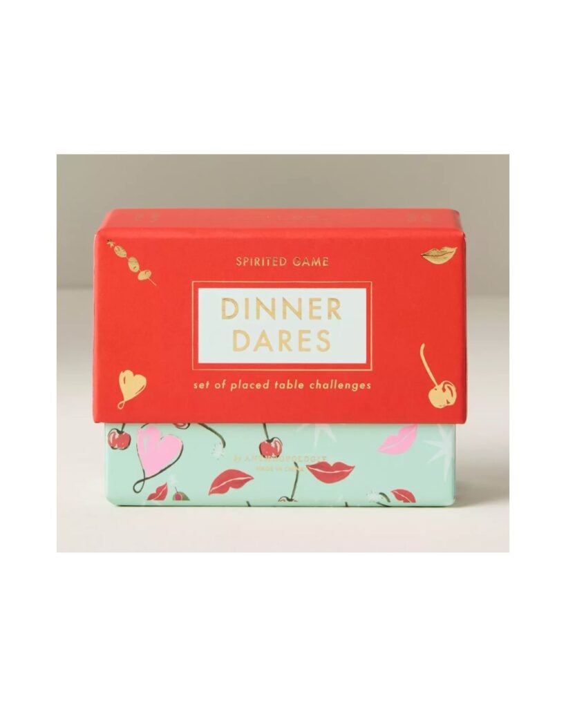 Dinner Dares card game box stacked with colorful packaging and playful illustrations